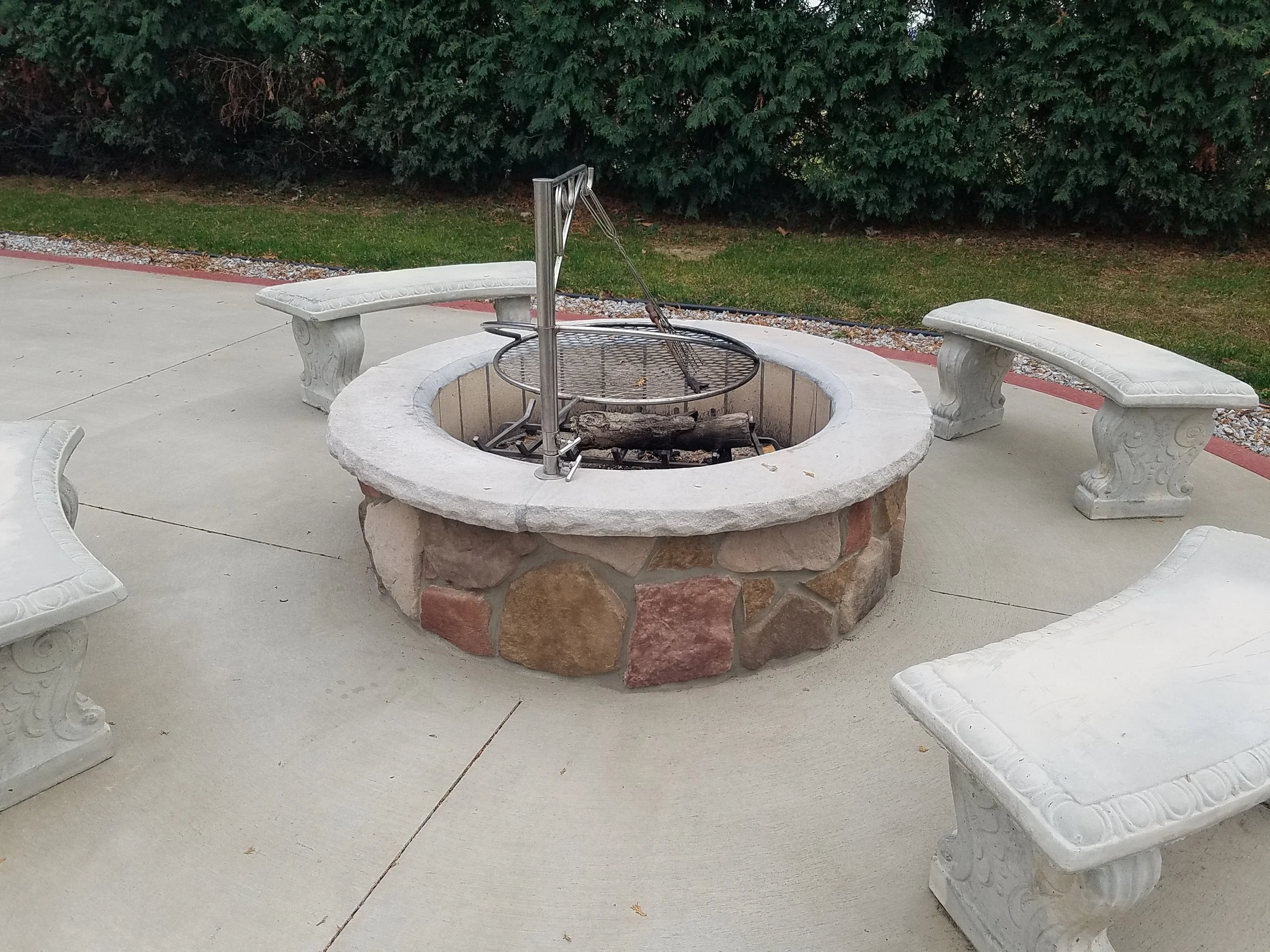 Outdoor stone fire pit